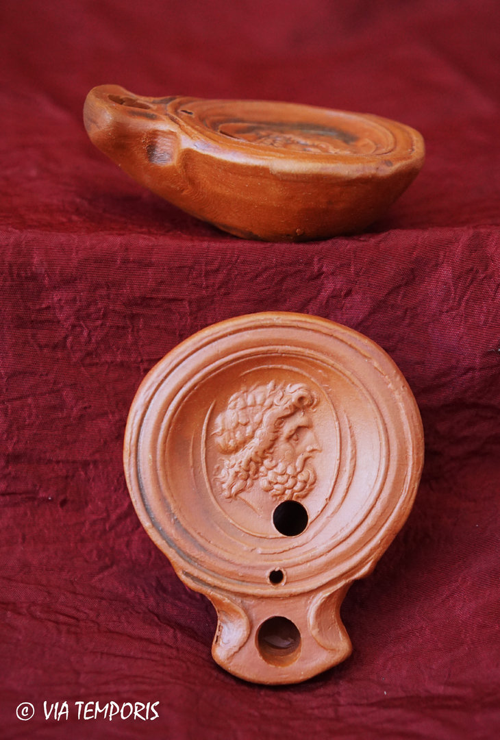 GALLO-ROMAN OIL LAMP WITH JUPITER'S HEAD SIDE VIEW