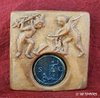 DISPLAY "WINGED LOVES HITTING COINS" WITH A ROMAN COIN